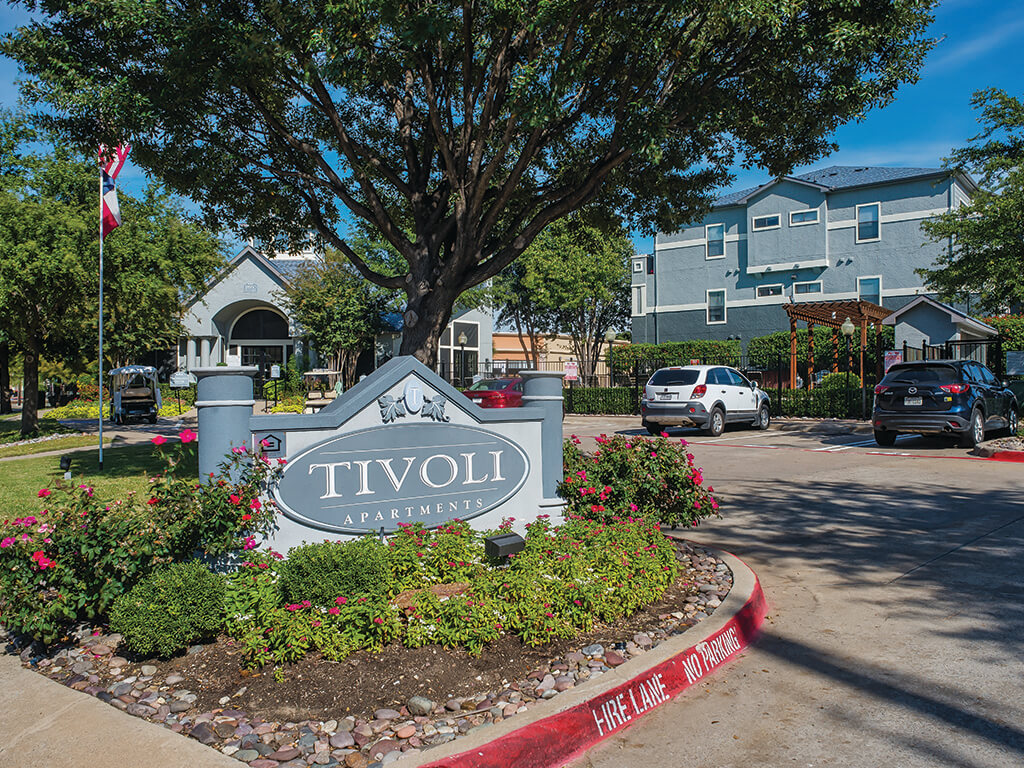 marquee sign at tivoli apartments in dallas texas, an affordable housing community
